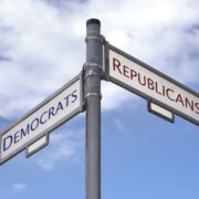 A street sign depicting the choice between Democrat and Republican